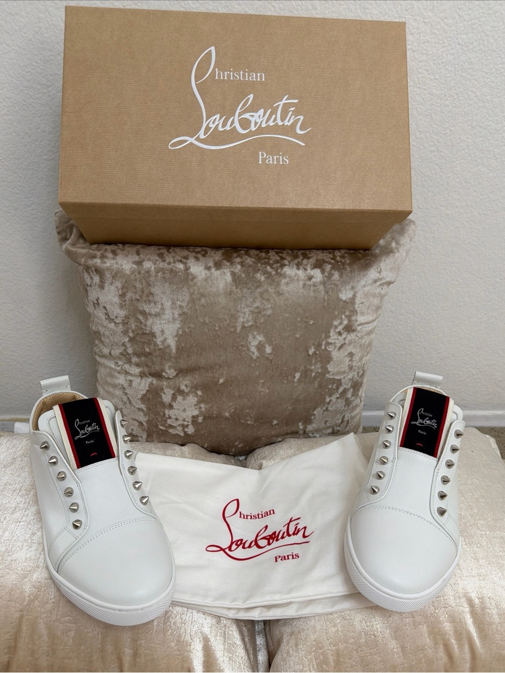 Christian Louboutin White Slip-On Sneakers with Red Tongue Detail